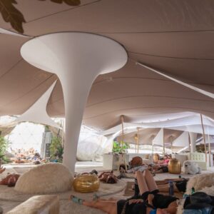 Tension Fabric column covers in tent stretch fabric shapes tensioned as decor and soft sculpture