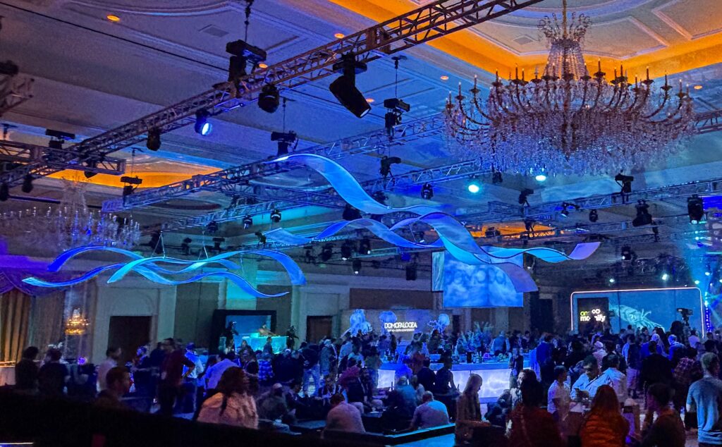 Tension Fabric decor rental is The Originators specialty You get a customized look for a rental price! Suspended Airwaves seen Here!