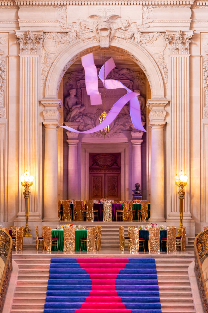 Opera Ball 2023 | San Francisco City Hall | September 8, 2023 | IDEAS Events | Photo © Show Ready, @showreadyphoto tension fabric ribbons our clients DIY, The Originators design rentals for events for you do self install. Suspended for great effect.